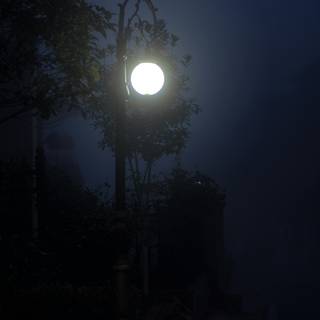 Street lamp in the fog 4k wallpaper