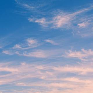 Blue clouds iPhone wallpaper