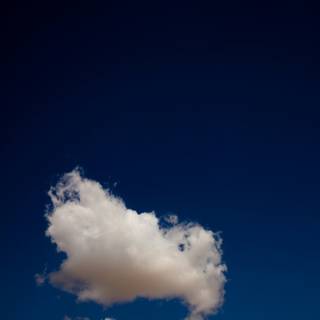 Blue clouds iPhone wallpaper