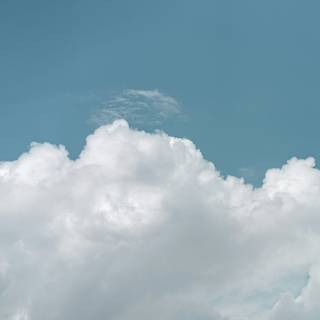 Blue clouds iPhone wallpaper