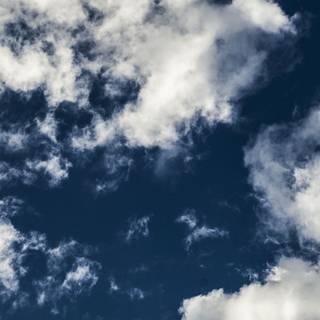 Blue clouds iPhone wallpaper