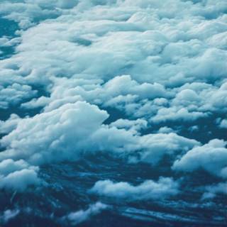 Blue clouds iPhone wallpaper
