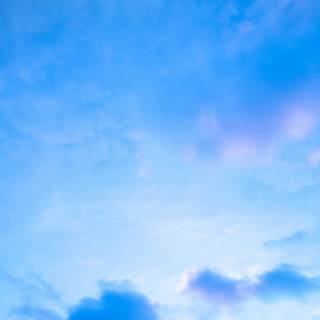 Blue clouds iPhone wallpaper