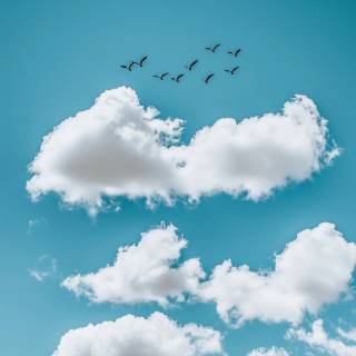 Blue clouds iPhone wallpaper