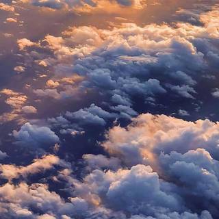 Blue clouds iPhone wallpaper