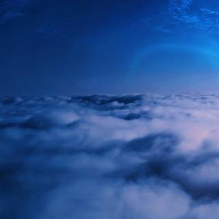 Blue clouds iPhone wallpaper