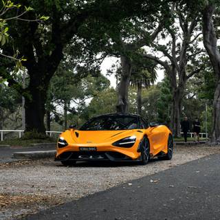 McLaren 765LT orange on road wallpaper