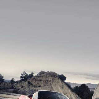 McLaren 765LT orange on road wallpaper