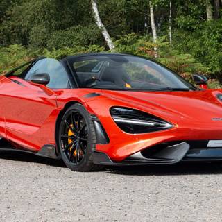 McLaren 765LT orange on road wallpaper