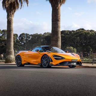 McLaren 765LT orange on road wallpaper