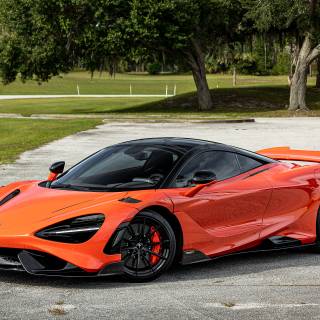 McLaren 765LT orange on road wallpaper
