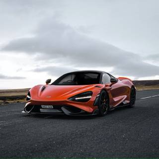 McLaren 765LT orange on road wallpaper