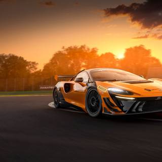 McLaren 765LT orange on road wallpaper