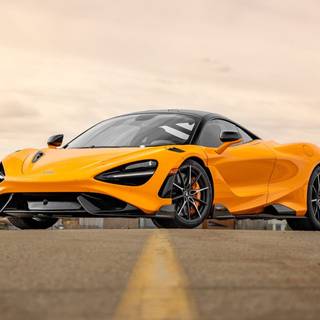 McLaren 765LT orange on road wallpaper