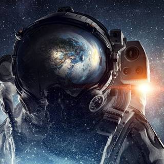 Astronaut near planet wallpaper
