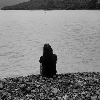 Sitting alone wallpaper