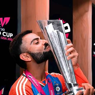 Virat Kohli with trophy wallpaper