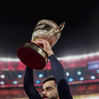 Virat Kohli with trophy wallpaper