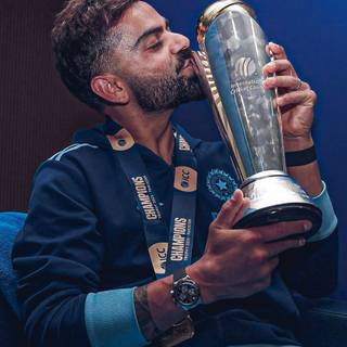 Virat Kohli with trophy wallpaper