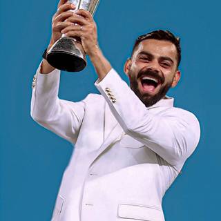 Virat Kohli with trophy wallpaper