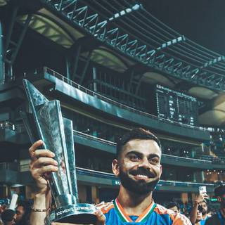 Virat Kohli with trophy wallpaper