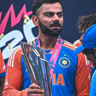 Virat Kohli with trophy wallpaper