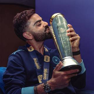 Virat Kohli with trophy wallpaper