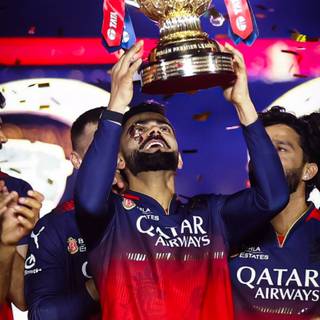 Virat Kohli with trophy wallpaper