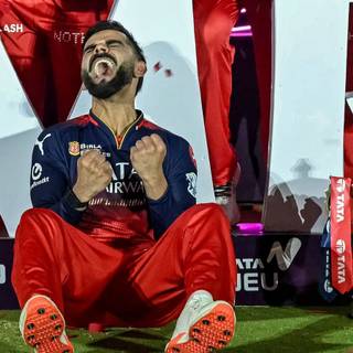 Virat Kohli with trophy wallpaper