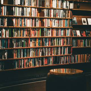 Bookshelf filled with books wallpaper