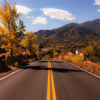 Autumn mountain road wallpaper