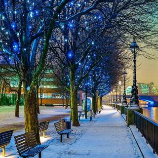 Snow and Christmas lights wallpaper