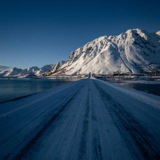 Winter road iPhone wallpaper