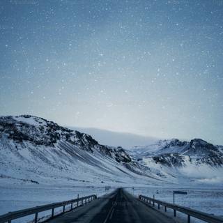Winter road iPhone wallpaper