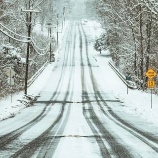 Winter road iPhone wallpaper