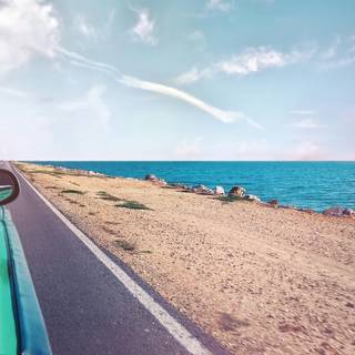 Car on beach wallpaper