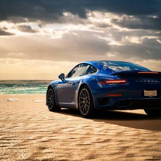 Car on beach wallpaper