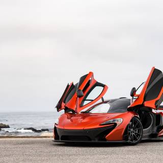 Car on beach wallpaper