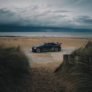 Car on beach wallpaper