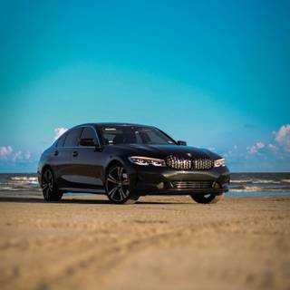Car on beach wallpaper