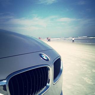 Car on beach wallpaper
