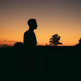 Alone boy sunset wallpaper