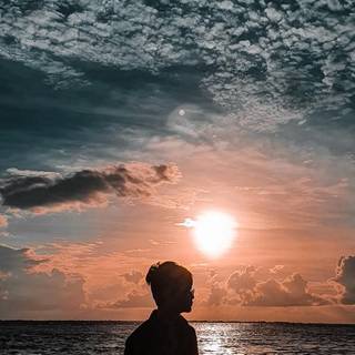 Alone boy sunset wallpaper