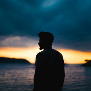 Alone boy sunset wallpaper