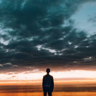 Alone boy sunset wallpaper