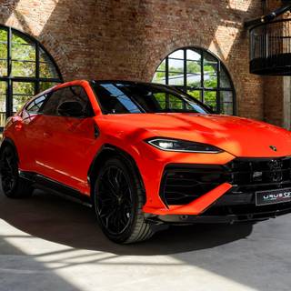 Red Lamborghini Urus wallpaper