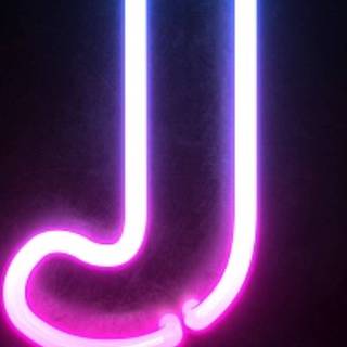 Purple neon letter J wallpaper