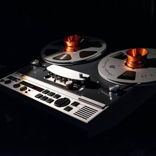 Reel-to-reel audio tape recording wallpaper