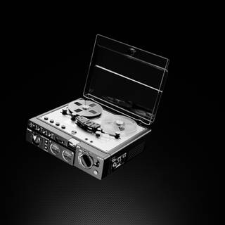 Reel-to-reel audio tape recording wallpaper