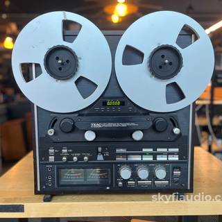 Reel-to-reel audio tape recording wallpaper
